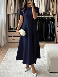 Elegant dark blue short sleeve evening dress in A-line cut with a round neckline