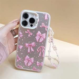 Pink bow and white polka dot clear phone case with beaded butterfly charm and heart strap