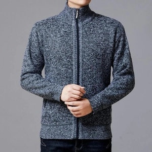 Detail of the gray-blue knit texture and zipper closure on this men's standing collar cardigan