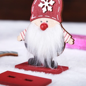 Macro view of wooden Christmas gnome ornament with white fuzzy beard