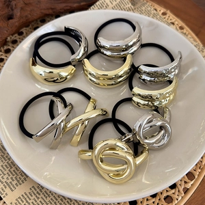 Minimalist geometric metal hair ties in gold and silver set for ponytail styling