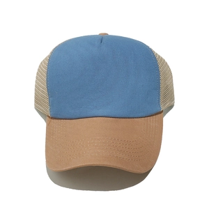 Top view of two-tone light blue and khaki mesh trucker hat with durable stitching