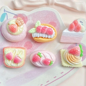 Detailed macro view of 6 assorted resin strawberry dessert charms for DIY crafts
