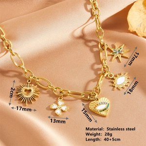 Golden stainless steel paperclip necklace with evil eye, clover and star charms