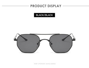 Detail view of double bridge black hexagonal pilot sunglasses with slim metal frames