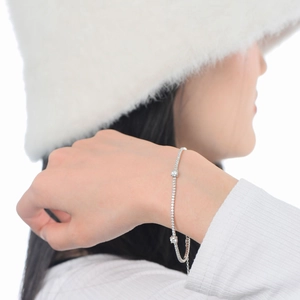 Minimalist S925 sterling silver moissanite bracelet with small cube design on wrist