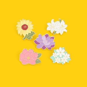 Five-piece set of cartoon sunflower and lily enamel pins with vibrant floral designs