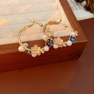 Vintage enamel flower hoop earrings with pearls and crystals in a luxury wooden box