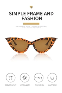 Close-up of cat-eye sunglasses featuring classic leopard tortoiseshell frames and brown lenses