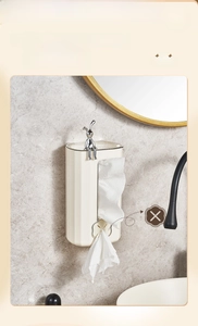 Wall-mounted cream-colored tissue box with silver rabbit decor and silicone opening