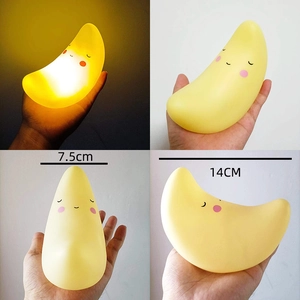 Cute moon-shaped LED night light with smiling face in 7.5cm and 14cm sizes