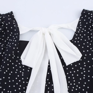 French style polka dot dress featuring an elegant back tie-up bow and slim fit design