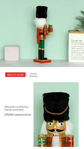 Detail of hand-painted wooden nutcracker in red plaid uniform holding gift boxes