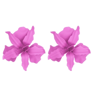 Macro detail of oversized magenta flower earrings with a matte textured lacquered finish