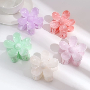 Detailed set of five acetate flower hair clips in pastel marble colors with metal springs