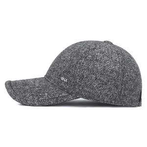 Winter men's herringbone baseball cap with metal China badge and warm ear protection