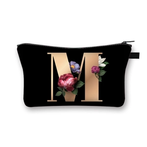 Black polyester dumpling makeup bag with gold letter M and colorful floral print