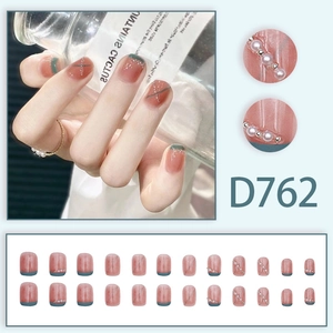 French style press-on nails set with pink base, teal tips, pearls and silver lines