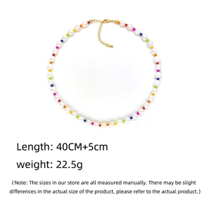 Natural freshwater pearl necklace with colorful beads and gold lobster clasp extension
