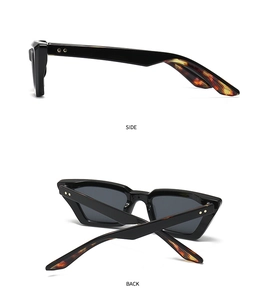 Detailansicht der schwarzen Katzenaugen-Sonnenbrille mit goldenen Sternnieten am Bügel