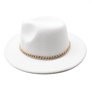 Close-up of white wool fedora hat featuring a chunky gold metal chain link decoration