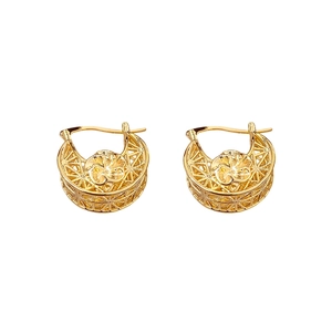 Elegant gold hollowed flower hoop earrings with intricate floral design and polished finish