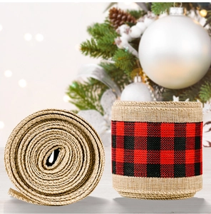 Detailed macro view of rustic burlap ribbon with red and black buffalo plaid pattern