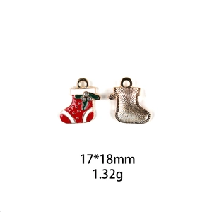 Front and back detail of 17x18mm Christmas stocking alloy pendant with red enamel and rhinestones