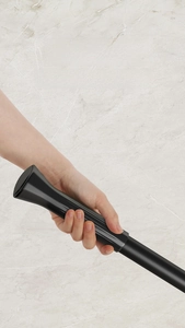 Close-up of ergonomic black non-slip handle for S-shaped extendable toilet brush