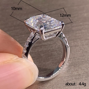 Silver ring with emerald cut 10x12mm simulated diamond and side stone accents