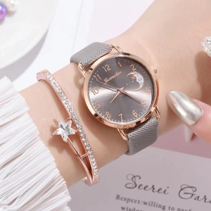 Women's rose gold quartz watch with moon dial and matching crystal star bracelet set