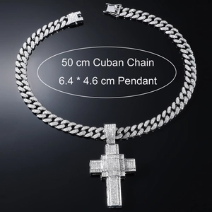 Hip hop silver Cuban chain necklace with a large iced out cross pendant and crystals