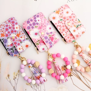 Floral silicone bead keychain wallets with fringe tassels and snap closure set