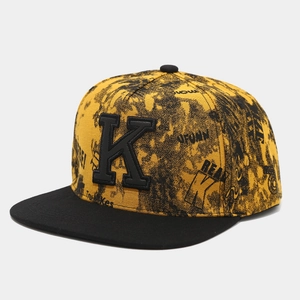 Flat brim snapback hat with 3D letter K embroidery and graffiti print in yellow and black