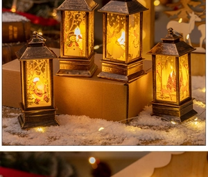 Set of vintage bronze Christmas lanterns with LED candles showing Santa and deer motifs