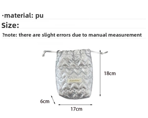 Silver PU drawstring camera bag with heart quilting and 18x17x6cm size details