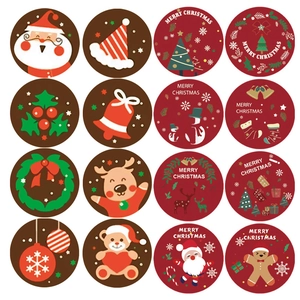 Roll of 500 festive Christmas stickers featuring Santa and snowman for DIY gift decor