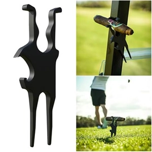 Matte black golf divot tool with integrated cigar holder and grass repair forks