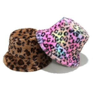 Stylish leopard print faux fur bucket hats in classic tan and rainbow colors for winter