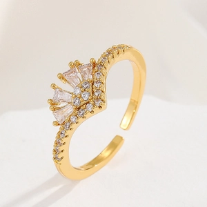 Macro shot of 18K gold plated ring with pave zircons and crown-shaped fan design detail