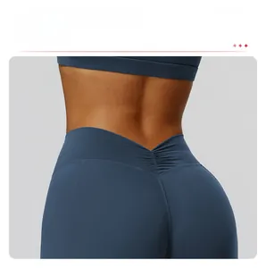 Detail view of high waist yoga flare pants featuring deep V-shaped ruched back design