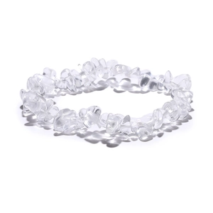 Macro view of clear irregular crystal beads on a handmade stretch beaded bracelet