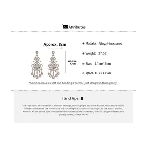 Detail showing dimensions of sparkling teardrop earrings with alloy and rhinestone inlay