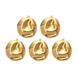 Macro detail of five gold 304 stainless steel lava texture irregular round pendants