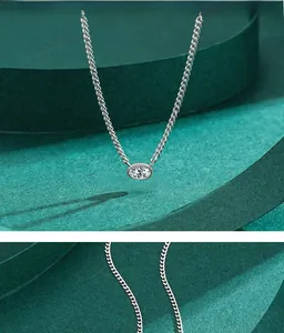 Detailed view of s925 silver oval cubic zirconia pendant on classic thin chain