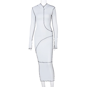 Detail view of white long sleeve hooded maxi dress with black contrast stitching lines