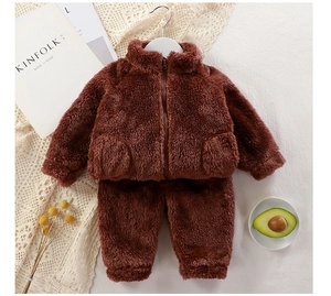 Detail of dark brown baby fleece tracksuit set featuring zipper jacket and elastic pants