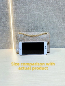 Champagne gold rhinestone handbag size comparison with smartphone and gold chain strap