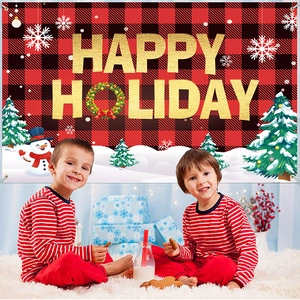Red black plaid banner featuring Happy Holiday text with snowman and snowy trees decor
