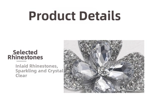 Macro detail of silver four-leaf clover brooch featuring sparkling crystal rhinestones
